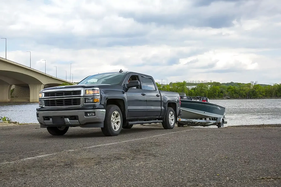 Truck with a boat on a boat ramp
