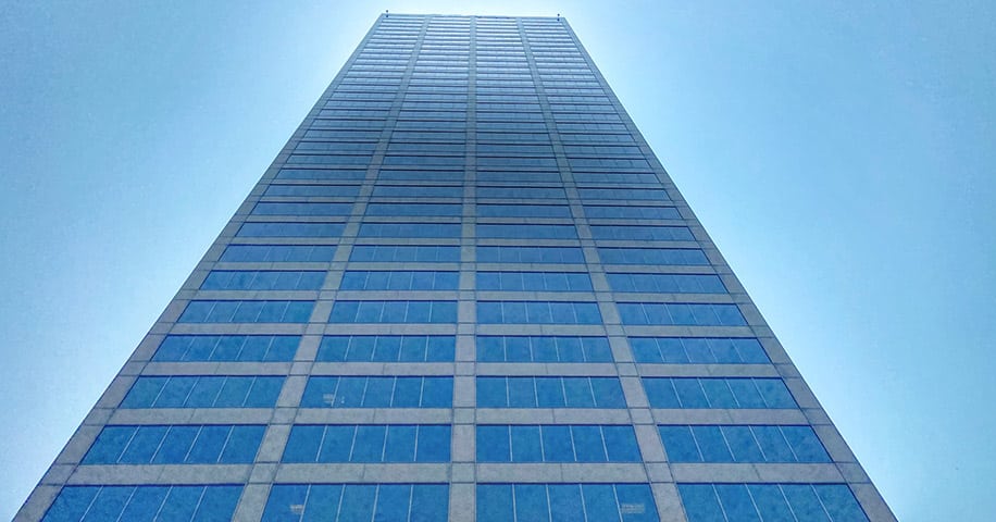 A view of a skyscraper in downtown Little Rock, Arkansas looking upward