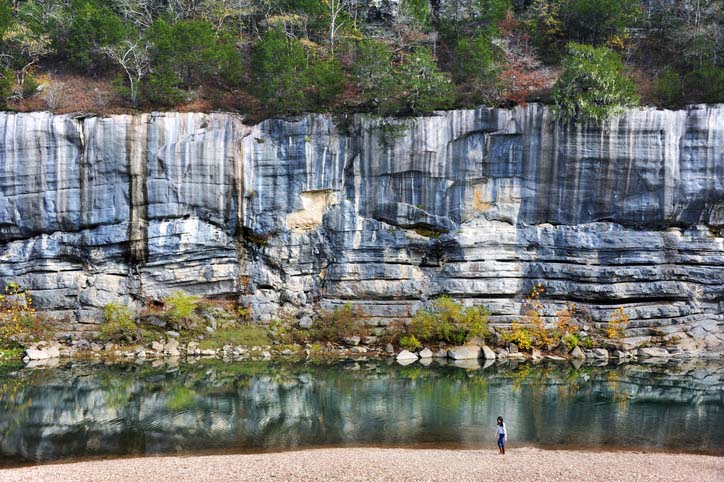 Beautiful river located in Arkansas called the Buffalo River with high cliff walls and turquoise waters.
