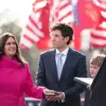 Governor Sarah Huckabee Sanders being sworn in with her husband and children alongside her